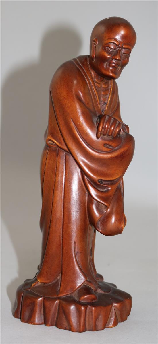 A Chinese boxwood standing figure of Luohan, 23.5cm